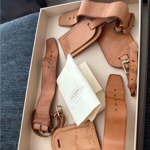 Louis Vuitton luggage /bag name tag 3 sets with box . Each set $82 no box.